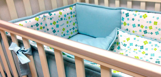 detskaya-krovatka-s-tkanevymi-bortikami